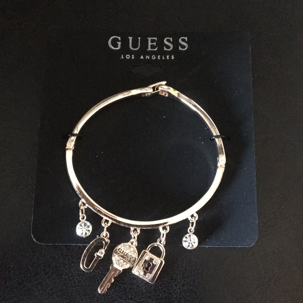 Guess bangle w charms crystals key